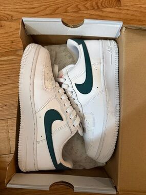 Nike White Low-Top Sneakers with Dark Teal Swoosh